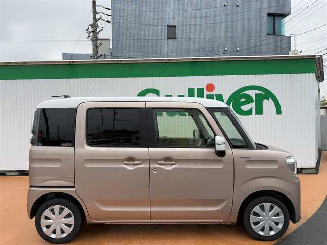 マツダ フレアワゴン ハイブリッド XS 鹿児島県 2023(令5)年 2.6万km ピンクⅡ ワンオーナー     /新車保証書・取扱説明書/スマートキー×2/メーカーOP：40.000円/ホワイトルーフ・ホワイトドアミラー/セーフティサポート（予備安全技術）/：デュアルカメラブレーキサポート/：アダプティブクルーズコントロール/：誤発進抑制機能：車線逸脱警報機能/：車線逸脱抑制機能：先行車発信おしらせ機能/：ふらつき警報機能：発進お知らせ機能/：ハイビームアシスト：リアパーキングセンサー/メーカーOP：50.000円/全方位モニター用カメラパッケージ/：フロント・サイド・バックカメラ/：ステアリングスイッチ/メーカーOP：75.000円/アップグレードパッケージ/フルLEDヘッドライト・LEDポジションランプ/ウィンカーミラー/パワースライドドア（運転席・助手席）/シートヒーター（運転席）/：パーソナルテーブル（運転席）/：オートエアコン/：エコクール/：スリムサーキュレーター