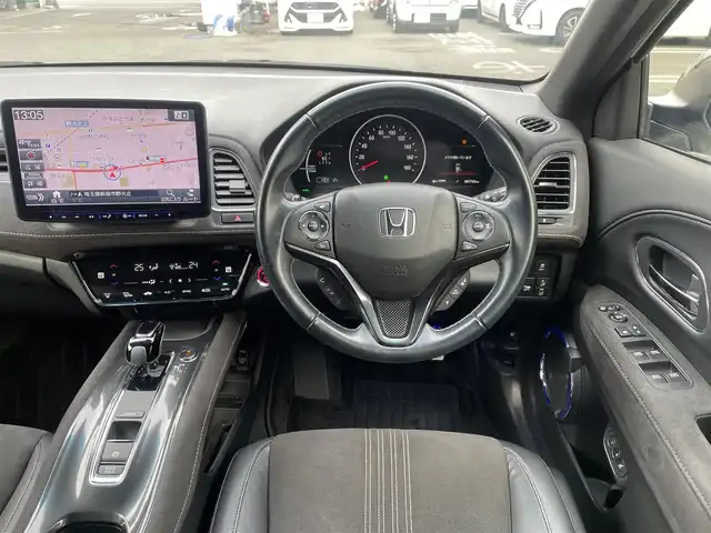 ホンダ ヴェゼル ハイブリッド RS ホンダセンシング 埼玉県 2019(令1)年 8.8万km プラチナホワイトパール /ワンオーナー//社外11型メモリナビ//フルセグTV//バックカメラ//フリップダウンモニター//アダプティブクルーズコントロール//ビルトインETC//スマートキーx2//LEDヘッドライト//LEDフォグ//前2席パワーシート//前2席シートヒーター//ハーフレザーシート//CMBS衝突軽減ブレーキ//LKAS車線維持支援システム//W.サイド.カーテンエアバッグ//ABS//横滑り防止装置//パドルシフト//革巻きステアリング//オートライト//スモークフィルム//純正18インチAW//新車時保証書//取扱説明書//ナビ取説