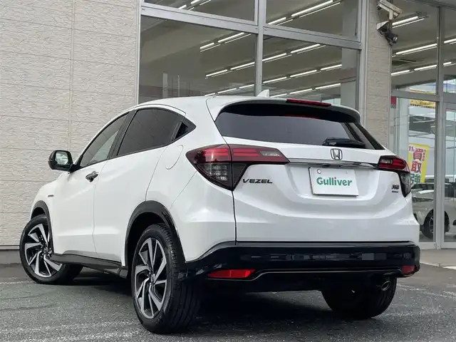 ホンダ ヴェゼル ハイブリッド RS ホンダセンシング 埼玉県 2019(令1)年 8.8万km プラチナホワイトパール /ワンオーナー//社外11型メモリナビ//フルセグTV//バックカメラ//フリップダウンモニター//アダプティブクルーズコントロール//ビルトインETC//スマートキーx2//LEDヘッドライト//LEDフォグ//前2席パワーシート//前2席シートヒーター//ハーフレザーシート//CMBS衝突軽減ブレーキ//LKAS車線維持支援システム//W.サイド.カーテンエアバッグ//ABS//横滑り防止装置//パドルシフト//革巻きステアリング//オートライト//スモークフィルム//純正18インチAW//新車時保証書//取扱説明書//ナビ取説