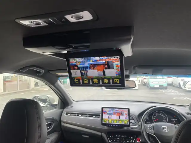 ホンダ ヴェゼル ハイブリッド RS ホンダセンシング 埼玉県 2019(令1)年 8.8万km プラチナホワイトパール /ワンオーナー//社外11型メモリナビ//フルセグTV//バックカメラ//フリップダウンモニター//アダプティブクルーズコントロール//ビルトインETC//スマートキーx2//LEDヘッドライト//LEDフォグ//前2席パワーシート//前2席シートヒーター//ハーフレザーシート//CMBS衝突軽減ブレーキ//LKAS車線維持支援システム//W.サイド.カーテンエアバッグ//ABS//横滑り防止装置//パドルシフト//革巻きステアリング//オートライト//スモークフィルム//純正18インチAW//新車時保証書//取扱説明書//ナビ取説