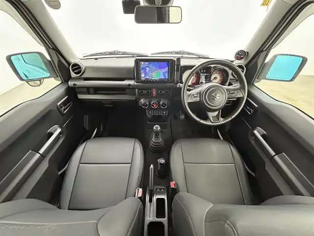 スズキ ジムニー XC 岡山県 2023(令5)年 1.8万km スターゲイズブルーパールメタリック 純正8型ナビ/・FM/AM/Bluetooth/フルセグ/CD/DVD/バックカメラ/社外マフラー/マッドフラップ/シートカバー/シートヒーター/LEDヘッドライト/ドライブレコーダー/スズキセーフティーサポート/・ディアルカメラブレーキサポート/・レーンキープアシスト/・クルーズコントロール/純正アルミ/フロアマット