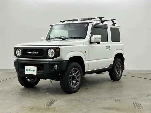 スズキ ジムニー XC 岡山県 2023(令5)年 1.8万km スターゲイズブルーパールメタリック 純正8型ナビ/・FM/AM/Bluetooth/フルセグ/CD/DVD/バックカメラ/社外マフラー/マッドフラップ/シートカバー/シートヒーター/LEDヘッドライト/ドライブレコーダー/スズキセーフティーサポート/・ディアルカメラブレーキサポート/・レーンキープアシスト/・クルーズコントロール/純正アルミ/フロアマット