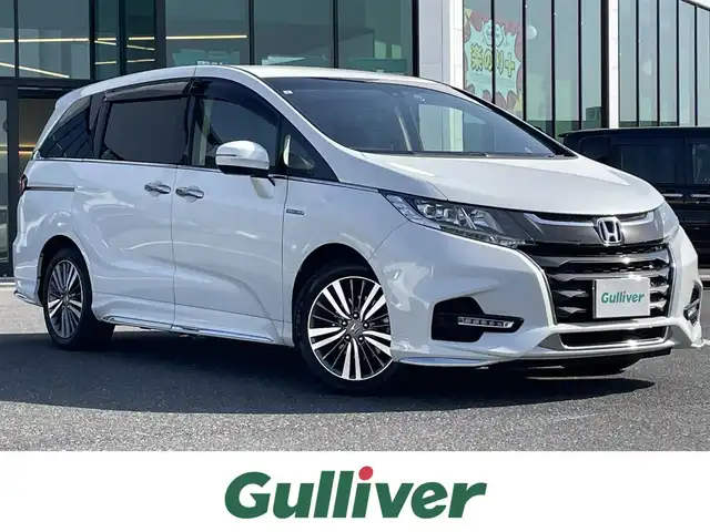 ホンダ オデッセイ ハイブリッド アブソルート ホンダセンシング 島根県 2019(令1)年 5.8万km プラチナホワイトパール 純正ナビ/CD/DVD/DTV/Bluetooth/バックカメラ/両側パワースライドドア /レーダークルーズコントロール/パワーシート/ハーフレザー調シート/ドライブレコーダー/ビルトインETC2.0/スマートキー/プッシュスタート /純正アルミホイール/ステアリングスイッチ