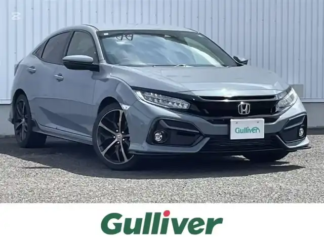 ホンダ シビック ハッチバック 熊本県 2021(令3)年 4.9万km ソニックグレーパール 純正ナビ/・AM/FM/CD/DVD/BT/SD/・フルセグTV/・バックカメラ/ホンダセンシング/・衝突軽減ブレーキ/・路外逸脱抑制機能/・アダプティブクルーズコントロール/・車線維持支援システム/・オートハイビーム/・標識認識機能/ビルトインETC2.0/ハーフレザーシート/・前席シートヒーター/・前席パワーシート/オートライト/・LEDヘッドライト/・フォグランプ/電動パーキングブレーキ/・オートホールドブレーキ/革巻きステアリング/・ステアリングスイッチ/・パドルシフト/電動格納ミラー/・ウインカーミラー/純正フロアマット/アイドリングストップ/プッシュスタート/スマートキー