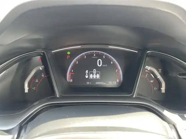 ホンダ シビック ハッチバック 熊本県 2021(令3)年 4.9万km ソニックグレーパール 純正ナビ/・AM/FM/CD/DVD/BT/SD/・フルセグTV/・バックカメラ/ホンダセンシング/・衝突軽減ブレーキ/・路外逸脱抑制機能/・アダプティブクルーズコントロール/・車線維持支援システム/・オートハイビーム/・標識認識機能/ビルトインETC2.0/ハーフレザーシート/・前席シートヒーター/・前席パワーシート/オートライト/・LEDヘッドライト/・フォグランプ/電動パーキングブレーキ/・オートホールドブレーキ/革巻きステアリング/・ステアリングスイッチ/・パドルシフト/電動格納ミラー/・ウインカーミラー/純正フロアマット/アイドリングストップ/プッシュスタート/スマートキー