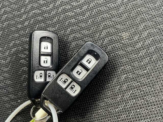 ホンダ Ｎ ＢＯＸ カスタム SSパッケージ 新潟県 2014(平26)年 3.2万km カトラリーシルバーM ナビ：VXM-155VXi/（BT/DTV/FM/AM/ワンセグ）/バックカメラ/両側電動ドア/スペアキー1本/ETC/純正14インチAW/純正フロアマット/ウィンカーミラー/フォグランプ