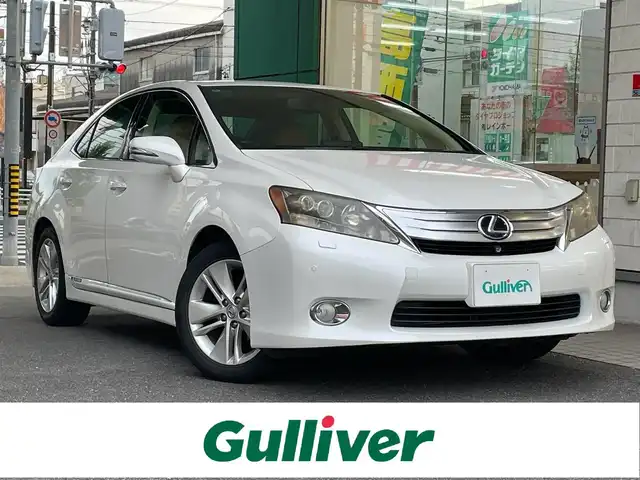 レクサス ＨＳ 250h バージョンI 愛知県 2010(平22)年 10.9万km ホワイトパールクリスタルシャイン 純正HDDナビ/・DVD／MD／MS／地デジTV/バックカメラ/ワイドビューフロントモニター/茶革シート/前席シートヒーター/シートベンチレーション/前席メモリ付パワーシート/クルーズコントロール/ウッドコンビステアリング/本木目パネル/電動リアサンシェード/ススマートキ×２＆カードキー/純正17インチAW/サイド＋カーテンエアバッグ