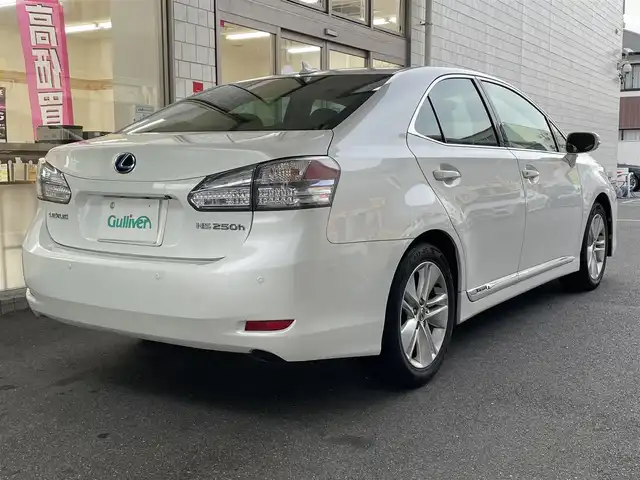 レクサス ＨＳ 250h バージョンI 愛知県 2010(平22)年 10.9万km ホワイトパールクリスタルシャイン 純正HDDナビ/・DVD／MD／MS／地デジTV/バックカメラ/ワイドビューフロントモニター/茶革シート/前席シートヒーター/シートベンチレーション/前席メモリ付パワーシート/クルーズコントロール/ウッドコンビステアリング/本木目パネル/電動リアサンシェード/ススマートキ×２＆カードキー/純正17インチAW/サイド＋カーテンエアバッグ