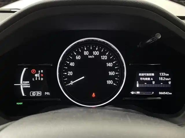 ホンダ ヴェゼル ハイブリッド 道央・札幌 2017(平29)年 6.7万km ホワイトオーキッドパール ・４WD/・寒冷地仕様/・純正SDナビゲーション/　CD/DVD/SD/BT/ワンセグ/USB/iPod/・社外前方録画ドライブレコーダー/・バックカメラ/・ビルトインETC/・ホンダセンシング/・衝突軽減ブレーキ/・レーンキープアシスト/・レーダークルーズコントロール/・先行車発進通知/・横滑り防止装置/・ハーフレザーシート/・前席シートヒーター/・LEDヘッドライト/・フロントフォグライト/・オートライト/・ステアリングスイッチ/・スマートキー/・プッシュスタート/・パドルシフト/・純正フロアマット/・チップアップシート/・純正AW17インチ/・ドアバイザー