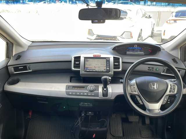 ホンダ フリード ハイブリット ジャストセレクション 三重県 2012(平24)年 9.7万km プレミアムブラキッシュパール 純正インターナビ/ワンセグTV/【CD/DVD/MSV】/バックカメラ/ビルトインETC/前後ドライブレコーダー/左側パワースライドドア/クルーズコントロール/オートライト/スマートキー/スペアキー/純正フロアマット