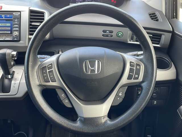 ホンダ フリード ハイブリット ジャストセレクション 三重県 2012(平24)年 9.7万km プレミアムブラキッシュパール 純正インターナビ/ワンセグTV/【CD/DVD/MSV】/バックカメラ/ビルトインETC/前後ドライブレコーダー/左側パワースライドドア/クルーズコントロール/オートライト/スマートキー/スペアキー/純正フロアマット