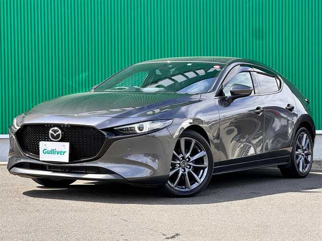 マツダ マツダ３ファストバック 20S プロアクティブ ツーリングS 千葉県 2021(令3)年 1.8万km マシーングレープレミアムM 地図SD未着のため、動作確認未/4WD/i-ACTIVESENSE/BSM/クリアランスソナー/純正SDナビ/【CD/DVD/BT/フルセグ】/バックカメラ/レーダークルーズコントロール/パワーシート(D/N)/シートヒーター(D/N)/パドルシフト/ステアリングスイッチ/パーキングホールド/オートライト/オートハイビーム/LEDヘッドライト/フォグライト/電動格納ミラー/ウィンカーミラー/純正AW/社外ドライブレコーダー(F)/革巻きハンドル/純正フロアマット/ドアバイザー/スマートキー/Pスタート