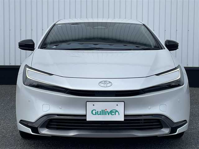 トヨタ プリウス Z 千葉県 2023(令5)年 3.6万km プラチナホワイトパールマイカ 純正12.3インチナビ/(フルセグTV BT FM AM HDMI)/全周囲カメラ/デジタルインナーミラー/ナビ連動前後ドライブレコーダー/ブラインドスポットモニター/置くだけ充電/メモリー付きパワーシート/衝突被害軽減システム/車線逸脱警報/クルーズコントロール/レザーシート/横滑り防止装置/ビルトインETC2.0/アイドリングストップ/LEDヘッドライト/オートライト/ウィンカーミラー/電動格納ミラー/純正19インチAW/シートヒーター/エアシート/シートリフター/ステアリングヒーター/TVキャンセラー/プッシュスタート/スマートキー/フロアマット/ドアバイザー/スペアキー/保証書