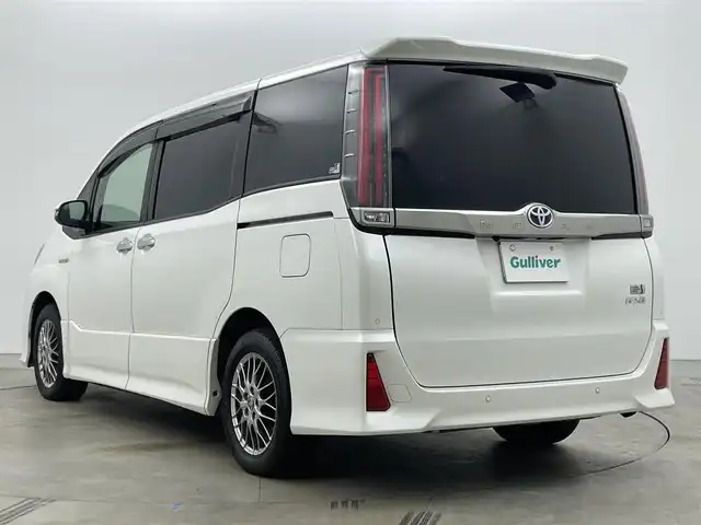 トヨタ ノア ハイブリッド Si ダブルバイビーⅡ 岡山県 2019(令1)年 6.2万km ホワイトパールクリスタルシャイン 純正9型ナビ（NSZT-Y68T）/【フルセグTV/CD/DVD/BT】/バックカメラ/純正12.1インチフリップダウンモニター/両側パワースライドドア/トヨタセーフティセンス/クルーズコントロール/ビルトインETC/ステアリングリモコン/ハーフレザーシート/D/Nシートヒーター/LEDオートライト/フォグランプ/スマートキー/プッシュスタート/フロアマット/純正ドアバイザー