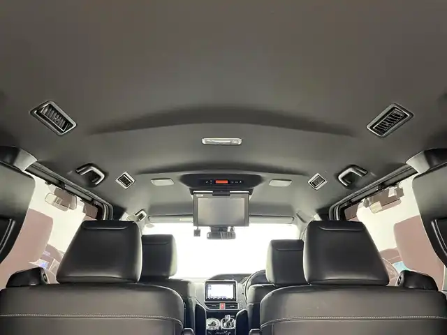 トヨタ ノア ハイブリッド Si ダブルバイビーⅡ 岡山県 2019(令1)年 6.2万km ホワイトパールクリスタルシャイン 純正9型ナビ（NSZT-Y68T）/【フルセグTV/CD/DVD/BT】/バックカメラ/純正12.1インチフリップダウンモニター/両側パワースライドドア/トヨタセーフティセンス/クルーズコントロール/ビルトインETC/ステアリングリモコン/ハーフレザーシート/D/Nシートヒーター/LEDオートライト/フォグランプ/スマートキー/プッシュスタート/フロアマット/純正ドアバイザー