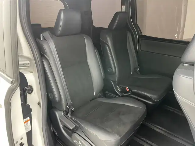 トヨタ ノア ハイブリッド Si ダブルバイビーⅡ 岡山県 2019(令1)年 6.2万km ホワイトパールクリスタルシャイン 純正9型ナビ（NSZT-Y68T）/【フルセグTV/CD/DVD/BT】/バックカメラ/純正12.1インチフリップダウンモニター/両側パワースライドドア/トヨタセーフティセンス/クルーズコントロール/ビルトインETC/ステアリングリモコン/ハーフレザーシート/D/Nシートヒーター/LEDオートライト/フォグランプ/スマートキー/プッシュスタート/フロアマット/純正ドアバイザー