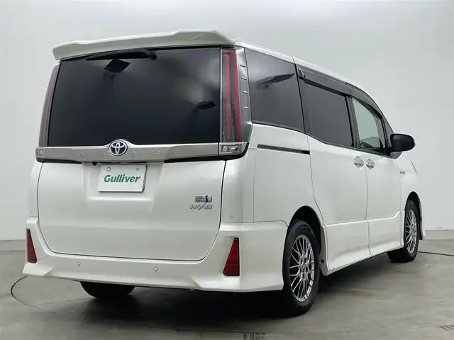 トヨタ ノア ハイブリッド Si ダブルバイビーⅡ 岡山県 2019(令1)年 6.2万km ホワイトパールクリスタルシャイン 純正9型ナビ（NSZT-Y68T）/【フルセグTV/CD/DVD/BT】/バックカメラ/純正12.1インチフリップダウンモニター/両側パワースライドドア/トヨタセーフティセンス/クルーズコントロール/ビルトインETC/ステアリングリモコン/ハーフレザーシート/D/Nシートヒーター/LEDオートライト/フォグランプ/スマートキー/プッシュスタート/フロアマット/純正ドアバイザー