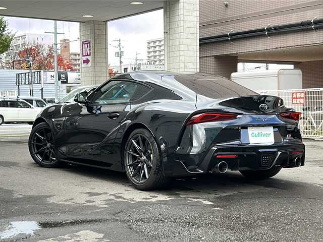 トヨタ スープラ RZ 道央・札幌 2023(令5)年 1.8万km ブラックメタリック 純正ナビ(FM/AM/BT/ワンセグTV)/バックカメラ/ETC2.0/ドライブレコーダー/JBLサウンド/GRスポーツマフラー/クルーズコントロール/前席シートヒーター/前席パワーシート/D席シートメモリー/コーナーセンサー/プッシュスタート/電動パーキングブレーキ/オートライト/オートマチックハイビーム/セーフティシステム/横滑り防止/スペアキー