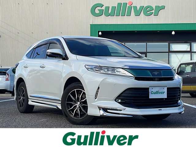 トヨタ ハリアー プレミアム 島根県 2017(平29)年 5万km ホワイトパールクリスタルシャイン 10インチALPINEナビ（EX10Z）/フルセグTV/Bluetooth接続/バックカメラ/モデリスタエアロ/パノラマサンルーフ/電動パーキングブレーキ/Toyota Safety Sense/・プリクラッシュセーフティシステム/・レーダークルーズコントロール/・レーンディパーチャーアラート/・オートマティックハイビーム/パワーバックドア/ハーフレザーシート/パワーシート/ドライブレコーダー/純正フロアマット・ドアバイザー