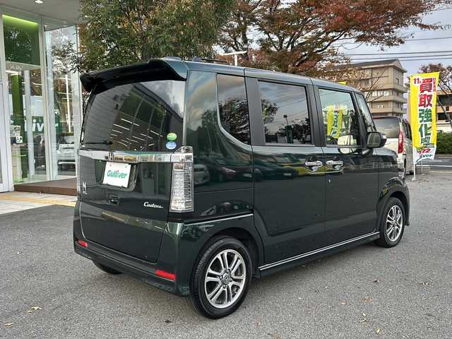 ホンダ Ｎ ＢＯＸ カスタム SSパッケージ 鳥取県 2016(平28)年 3.2万km ブリティッシュグリーンP 純正ギャザーズナビ/バックカメラ/フルセグＴＶ　ＤＶＤ　ＣＤ　ＳＤ　Ｂｌｕｅｔｏｏｔｈ/ナビ装着用スペシャルパッケージ/・ETC車載器(ナビ連動)/・オートエアコン（プラズマクラスター搭載）/・アレルクリーンシート/・運転席シートハイトアジャスター/・車速連動バリアブル間欠ワイパー/・リア左側パワースライドドア/・リアシートスライド/・シートバックテーブル/・リア右側パワースライドドア/あんしんパッケージ/・ディスチャージヘッドライト/・オートライトコントロール機構付/・オートリトラミラー/・ハーフシェイドフロントウィンドウ/・14インチアルミホイール/・360°スーパーUV・IRカットパッケージ/・リア席サンシェード/・ヒーテッドドアミラー/・フロントドア撥水ガラス/・シートヒーター/・LEDルームランプ/・エアコンアウトレットダブルリング(クロームメッキ)/・LEDフォグライト/・LEDポジションランプ/・フォグライトガーニッシュ/フロアマット/スマートキー/新車保証書/取扱説明書