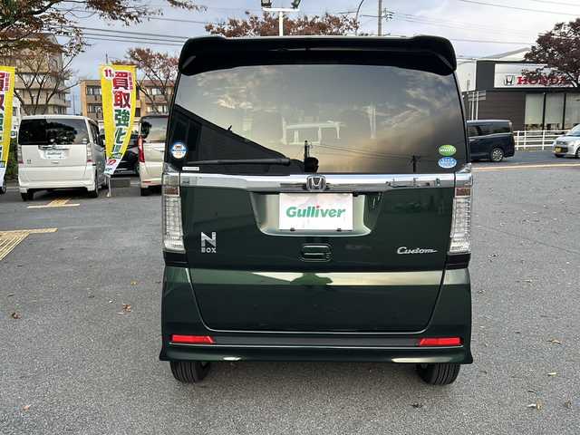 ホンダ Ｎ ＢＯＸ カスタム SSパッケージ 鳥取県 2016(平28)年 3.2万km ブリティッシュグリーンP 純正ギャザーズナビ/バックカメラ/フルセグＴＶ　ＤＶＤ　ＣＤ　ＳＤ　Ｂｌｕｅｔｏｏｔｈ/ナビ装着用スペシャルパッケージ/・ETC車載器(ナビ連動)/・オートエアコン（プラズマクラスター搭載）/・アレルクリーンシート/・運転席シートハイトアジャスター/・車速連動バリアブル間欠ワイパー/・リア左側パワースライドドア/・リアシートスライド/・シートバックテーブル/・リア右側パワースライドドア/あんしんパッケージ/・ディスチャージヘッドライト/・オートライトコントロール機構付/・オートリトラミラー/・ハーフシェイドフロントウィンドウ/・14インチアルミホイール/・360°スーパーUV・IRカットパッケージ/・リア席サンシェード/・ヒーテッドドアミラー/・フロントドア撥水ガラス/・シートヒーター/・LEDルームランプ/・エアコンアウトレットダブルリング(クロームメッキ)/・LEDフォグライト/・LEDポジションランプ/・フォグライトガーニッシュ/フロアマット/スマートキー/新車保証書/取扱説明書