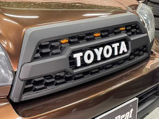 トヨタ ハイラックス サーフ SSR－X LTD 長野県 2005(平17)年 12.2万km 茶 社外パナソニックナビ/バックカメラ/Bluetooth/フルセグテレビ/Bratオリジナルシートカバー/社外エンジンスターター/JAOS BATTLEZマフラー/フロントグリルブラック塗装/ダッシュマット/ミラーヒーター/純正フロアマット/オートライト/社外サイドステップ/ETC/リフトアップ/全塗装/17インチAW　エクストリームJ XJ07/BFグッドリッチ　275/70-17/タコマルックグリル/ヘッドライト　インナーブラック加工