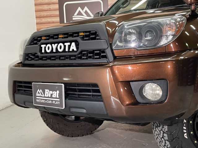 トヨタ ハイラックス サーフ SSR－X LTD 長野県 2005(平17)年 12.2万km 茶 社外パナソニックナビ/バックカメラ/Bluetooth/フルセグテレビ/Bratオリジナルシートカバー/社外エンジンスターター/JAOS BATTLEZマフラー/フロントグリルブラック塗装/ダッシュマット/ミラーヒーター/純正フロアマット/オートライト/社外サイドステップ/ETC/リフトアップ/全塗装/17インチAW　エクストリームJ XJ07/BFグッドリッチ　275/70-17/タコマルックグリル/ヘッドライト　インナーブラック加工