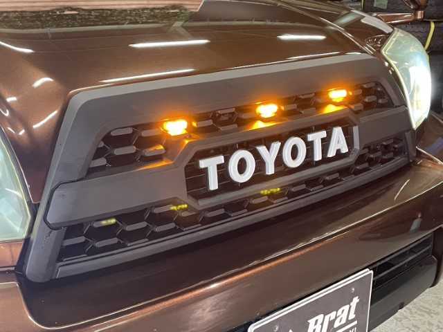 トヨタ ハイラックス サーフ SSR－X LTD 長野県 2005(平17)年 12.2万km 茶 社外パナソニックナビ/バックカメラ/Bluetooth/フルセグテレビ/Bratオリジナルシートカバー/社外エンジンスターター/JAOS BATTLEZマフラー/フロントグリルブラック塗装/ダッシュマット/ミラーヒーター/純正フロアマット/オートライト/社外サイドステップ/ETC/リフトアップ/全塗装/17インチAW　エクストリームJ XJ07/BFグッドリッチ　275/70-17/タコマルックグリル/ヘッドライト　インナーブラック加工