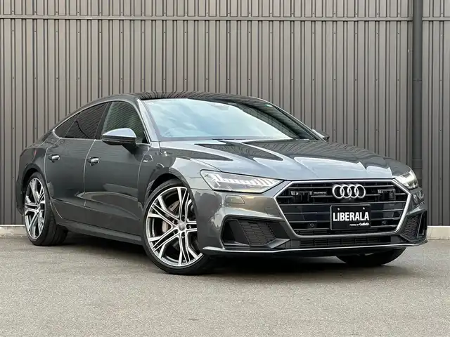 アウディ Ａ７ SB 55TFSIクワトロSライ 福島県 2019(平31)年 1.5万km デイトナグレーパールエフェクト ワンオーナー/パノラマサンルーフ/アダプティブクルーズコントロール/HDマトリクスLEDヘッドライトアウディレーザーライトパッケージ/・レーザーマトリクスLED/パワーアシストパッケージ/・パワークロージングドア/・電動チルト/アシスタンスパッケージ/・全方位カメラ/・アウディプレセンス/バルコナレザーシート（メトロポリタングレー）/メモリ付パワーシート/前席シートヒーター/バーチャルコックピットプラス/純正MMIナビ/CarPlay/マルチカラーアンビエントライティング/フルセグTV/サイドアシスト/レーンキープアシスト/パワーバックドア/純正21インチAW/ドラレコ前後/可変リアスポイラー/パドルシフト/取扱説明書/保証書/スペアキー