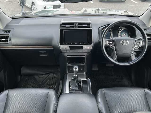 トヨタ ランドクルーザー プラド TX Lパッケージ 愛知県 2018(平30)年 9.8万km アティチュードブラックマイカ /禁煙車//モデリスタエアロ//純正９インチナビ・フルセグTV/　(NSZT-Y66T)//バックカメラ//ビルトインETC//黒革シート//前席パワーシート//前席シートヒーター//純正フロアマット//LEDオートライト//ドライブレコーダー//セーフティセンス//クルーズコントロール//オートハイビーム//純正１７インチアルミ//ステアリングスイッチ//新車保証書/取扱説明書//スペアキー