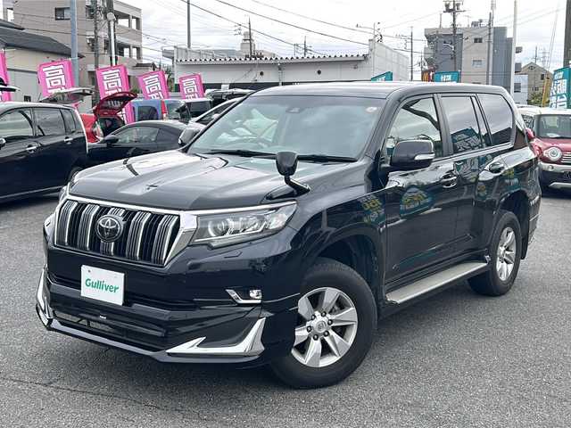 トヨタ ランドクルーザー プラド TX Lパッケージ 愛知県 2018(平30)年 9.8万km アティチュードブラックマイカ /禁煙車//モデリスタエアロ//純正９インチナビ・フルセグTV/　(NSZT-Y66T)//バックカメラ//ビルトインETC//黒革シート//前席パワーシート//前席シートヒーター//純正フロアマット//LEDオートライト//ドライブレコーダー//セーフティセンス//クルーズコントロール//オートハイビーム//純正１７インチアルミ//ステアリングスイッチ//新車保証書/取扱説明書//スペアキー