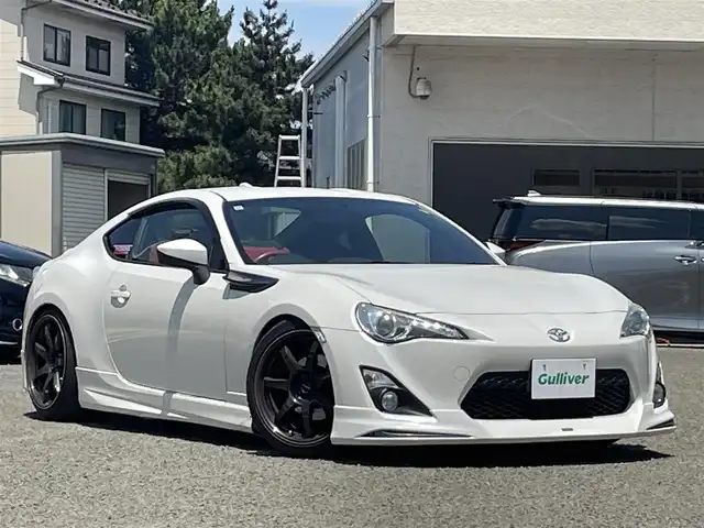 トヨタ ８６ GT リミテッド 宮城県 2015(平27)年 11万km クリスタルホワイトパール モデリスタエアロ/BLITS車高調/リアスポイラー/BLITZ製ストラットタワーバー/CROSS SPEED製アルミホイール18インチ/純正メモリナビ/ワンセグテレビ/FM・AM/CD・DVD/SD/Bluetooth/純正フロアマット/ETC2.0/クルーズコントロール/シートヒーターDN席/スマートキーx2