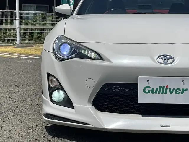 トヨタ ８６ GT リミテッド 宮城県 2015(平27)年 11万km クリスタルホワイトパール モデリスタエアロ/BLITS車高調/リアスポイラー/BLITZ製ストラットタワーバー/CROSS SPEED製アルミホイール18インチ/純正メモリナビ/ワンセグテレビ/FM・AM/CD・DVD/SD/Bluetooth/純正フロアマット/ETC2.0/クルーズコントロール/シートヒーターDN席/スマートキーx2