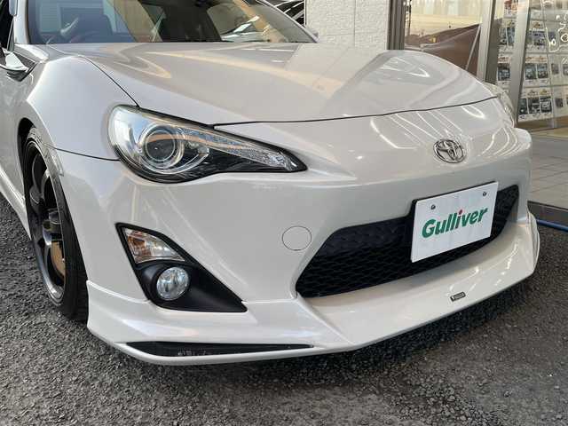 トヨタ ８６ GT リミテッド 宮城県 2015(平27)年 11万km クリスタルホワイトパール モデリスタエアロ/BLITS車高調/リアスポイラー/BLITZ製ストラットタワーバー/CROSS SPEED製アルミホイール18インチ/純正メモリナビ/ワンセグテレビ/FM・AM/CD・DVD/SD/Bluetooth/純正フロアマット/ETC2.0/クルーズコントロール/シートヒーターDN席/スマートキーx2