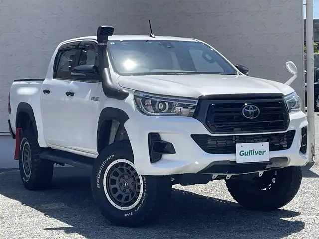 トヨタ ハイラックス Z ブラックラリーエディション 大阪府 2019(平31)年 6.4万km スーパーホワイトⅡ ワンオーナー/エアパイプインテーク/TSDマッドトラップ/TRDサイドステップ/純正SDナビ(NSZT-W68T)/BT/CD/SD/フルセグTV/バックカメラ/前後ドライブレコーダー/クルーズコントロール/レーンキープアシスト/ダウンヒルアシストコントロール/社外17インチAW/LEDヘッドライト/純正フロアマット/ドアバイザー/スペアキー/ETC