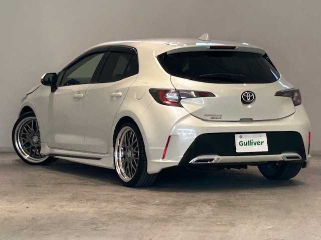 トヨタ カローラ スポーツ G Z 宮城県 2019(平31)年 6.5万km ホワイトパールクリスタルシャイン ワンオーナー/4WD/ターボ/モデリスタエアロ/ディーラーOPナビ/バックカメラ/フルセグTV/Bluetooth、CD、DVD/トヨタセーフティセンス/・プリクラッシュセーフティー/・レーントレーシングアシスト/・レーダークルーズコントロール/・オートマチックハイビーム/・ロードサインアシスト/パドルシフト/ブレーキホールド/フロントワイパーデアイサー/ステアリングヒーター/LEDヘッドライト/フォグランプ/社外サスペンション装着車/社外19インチアルミ/純正サスペンション積み込み/社外アルミ　1本積み込み/オートライト/純正フロアマット