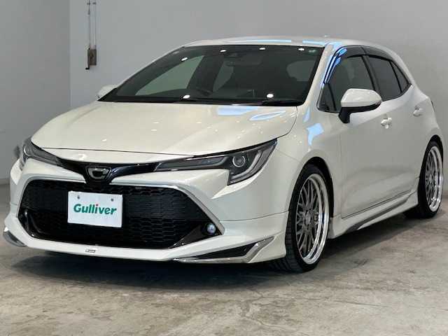 トヨタ カローラ スポーツ G Z 宮城県 2019(平31)年 6.5万km ホワイトパールクリスタルシャイン ワンオーナー/4WD/ターボ/モデリスタエアロ/ディーラーOPナビ/バックカメラ/フルセグTV/Bluetooth、CD、DVD/トヨタセーフティセンス/・プリクラッシュセーフティー/・レーントレーシングアシスト/・レーダークルーズコントロール/・オートマチックハイビーム/・ロードサインアシスト/パドルシフト/ブレーキホールド/フロントワイパーデアイサー/ステアリングヒーター/LEDヘッドライト/フォグランプ/社外サスペンション装着車/社外19インチアルミ/純正サスペンション積み込み/社外アルミ　1本積み込み/オートライト/純正フロアマット