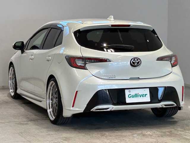 トヨタ カローラ スポーツ G Z 宮城県 2019(平31)年 6.5万km ホワイトパールクリスタルシャイン ワンオーナー/4WD/ターボ/モデリスタエアロ/ディーラーOPナビ/バックカメラ/フルセグTV/Bluetooth、CD、DVD/トヨタセーフティセンス/・プリクラッシュセーフティー/・レーントレーシングアシスト/・レーダークルーズコントロール/・オートマチックハイビーム/・ロードサインアシスト/パドルシフト/ブレーキホールド/フロントワイパーデアイサー/ステアリングヒーター/LEDヘッドライト/フォグランプ/社外サスペンション装着車/社外19インチアルミ/純正サスペンション積み込み/社外アルミ　1本積み込み/オートライト/純正フロアマット