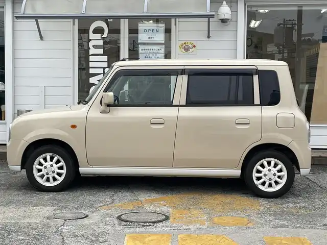 スズキ ラパン L 神奈川県 2007(平19)年 5.5万km ミルクティーベージュメタリック 純正メモリナビ/　（CD・ワンセグTV）/電動格納ミラー/キーレス/保証書/取扱説明書
