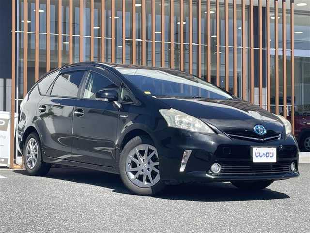 トヨタ プリウス α S チューンブラック 千葉県 2013(平25)年 10.6万km ブラック (株)IDOMが運営する【じしゃロン八千代店】の自社ローン対象車両になります。こちらは現金またはオートローンご利用時の価格です。自社ローンご希望の方は別途その旨お申付け下さい/純正ナビ（NSZT-W62G）/・CD/DVD/・Bluetooth接続/・フルセグTV/ビルトインETC/ステアリングリモコン/LEDヘッドライト/バックカメラ/スタッドレスタイヤ/純正アルミホイール/純正フロアマット/プッシュスタート/スマートキー/ドアバイザー/ウインカーミラー/オートライト