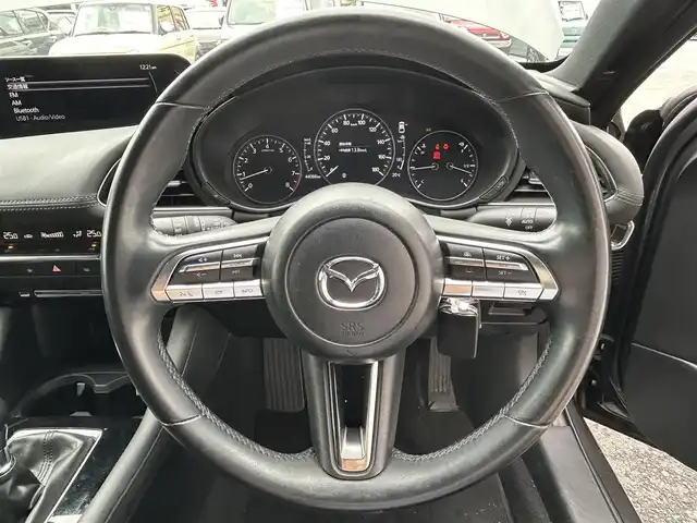 マツダ マツダ３ファストバック 15S ツーリング 宮城県 2019(令1)年 4.4万km マシーングレープレミアムM 登録時走行距離44086km/純正ナビ/FM・AM・TV・Bluetooth・CD・DVD・SD/アラウンドビューモニター/ETC/クルーズコントロール/６速マニュアル/クリアランスソナー/オートホールド機能/アイドリングストップ/スマートキー/スペアキーあり/社外アルミホイール/純正フロアマット/電動格納ミラー/オートライト/フルフラットシート/ドアバイザー