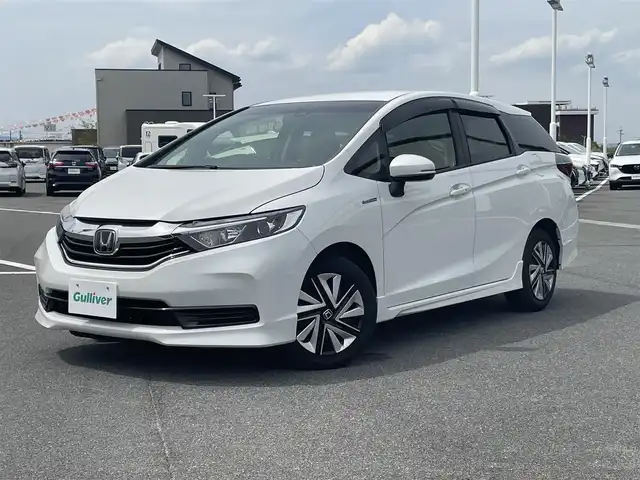 ホンダ シャトル ハイブリッド ホンダセンシング 奈良県 2021(令3)年 5.3万km プラチナホワイトパール メモリナビ　/バックカメラ　/追従クルーズコントロール　/Bluetooth　/ETC　/衝突軽減システム　/レーンキープアシスト　/スマートキー　/スペアキー1本　/オートライト　/純正アルミホイール　/横滑り防止装置