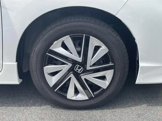ホンダ シャトル ハイブリッド ホンダセンシング 奈良県 2021(令3)年 5.3万km プラチナホワイトパール メモリナビ　/バックカメラ　/追従クルーズコントロール　/Bluetooth　/ETC　/衝突軽減システム　/レーンキープアシスト　/スマートキー　/スペアキー1本　/オートライト　/純正アルミホイール　/横滑り防止装置