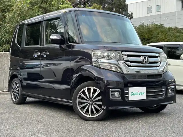 ホンダ Ｎ ＢＯＸ カスタム G ターボ Lパッケージ 長崎県 2016(平28)年 8.5万km トワイライトミストブラックパール 社外SDナビ(FM/AM/BT/フルセグTV)/ターボ/プッシュスタート/ビルトインETC/バックカメラ/両側パワースライドドア/パドルシフト/アイドリングストップ/ステアリングスイッチ/ハーフレザーシート/純正フロアマット/純正アルミホイール/オートライト/ABS/TCS/VSA/イモビライザー/スマートキー/電動格納ミラー