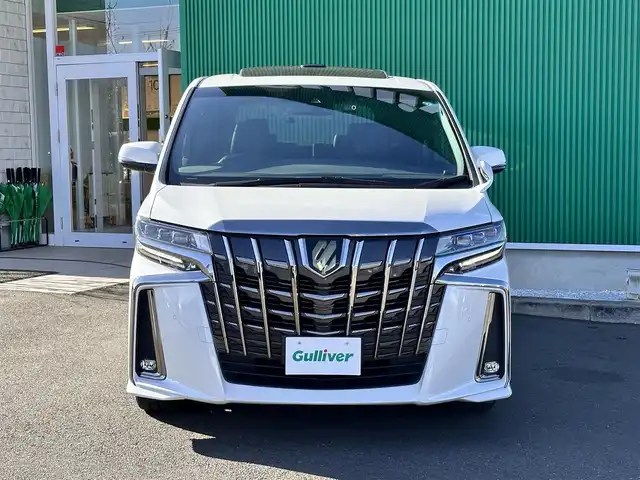 トヨタ アルファード S タイプゴールド 宮城県 2021(令3)年 5.2万km ホワイトパールクリスタルシャイン ツインムーンルーフ/デジタルインナーミラー/＝＝＝/セーフティセンス/・プリクラッシュセーフティ/・レーントレーシングアシスト/・アダプティブハイビームシステム/・全車速追従機能付レーダークルーズコントロール/・ロードサインアシスト/ブラインドスポットモニター/パーキングサポートブレーキ（後方接近車両/前後方静止物）/純正12インチフリップダウンモニター/9インチディスプレイオーディオ/・ナビ機能付/・CD/DVDデッキ/・Bluetooth/バックカメラ/ビルトインETC2.0/ドライブレコーダー/AC100V/100Wアクセサリーコンセント/パワーバックドア/両側パワースライドドア/ハーフレザーシート/ウッドコンビステアリング/ステアリングスイッチ/電動パーキングブレーキ/ブレーキホールド/3眼LEDヘッドランプ/フォグランプ/オートライト/スマートキー＆プッシュスタート/電動格納ミラー/純正18インチAW/フロアマット/ドアバイザー/W/サイド/カーテンエアバッグ