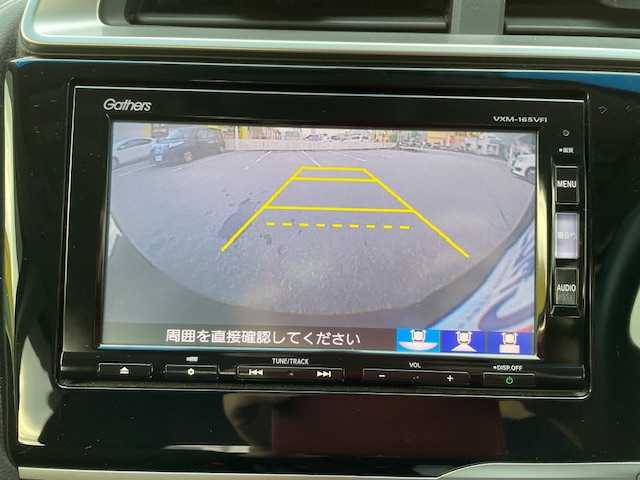 ホンダ フィット ハイブリット Fパッケージ 富山県 2015(平27)年 9.9万km クリスタルブラックパール (株)IDOMが運営する【じしゃロン富山店】の自社ローン専用車両になります。こちらは現金またはオートローンご利用時の価格です。自社ローンご希望の方は別途その旨お申し付け下さい/純正ナビ/バックカメラ/ETC/オートリトラミラー/横滑り防止/LEDヘッドライト/オートライト/プッシュスタート/スマートキー/スペアキー1本