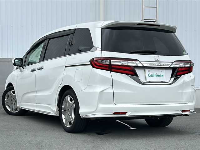 ホンダ オデッセイ アブソルート 三重県 2015(平27)年 12.8万km ホワイトオーキッドパール 純正８型ナビ　/バックカメラ　/両側パワースライドドア/ビルトインETC/レーダークルーズコントロール /レーンキープアシスト /アイドリングストップ/ホンダセンシング /前方ドライブレコーダー/LEDヘッドライト /オートライト /ステアリングスイッチ /ハーフレザーシート/電動格納ミラー /禁煙車