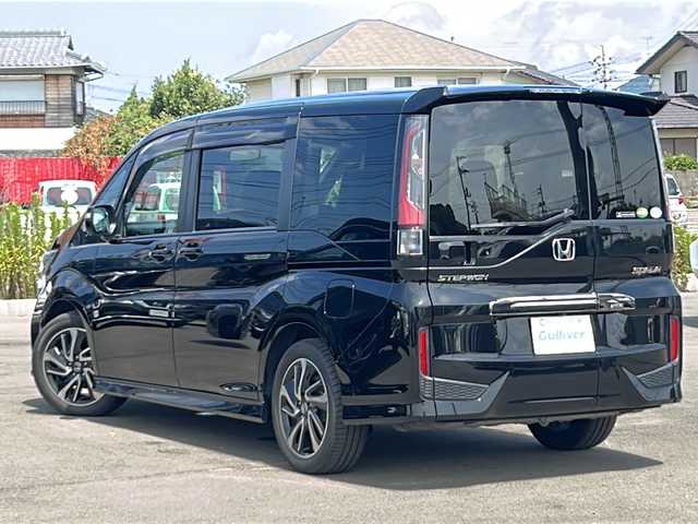 ホンダ ステップワゴン スパーダクールスピリット HセンシングBスタイル 山口県 2020(令2)年 5万km プレミアムスパークルブラックパール ・純正９インチナビ　/・バックカメラ　/・Bluetooth/・フルセグTV/・純正フリップダウンモニター　/・両側パワースライドドア　/・クルーズコントロール/・ハーフレザーシート　/・シートヒーター　/・純正１７インチアルミ　/・前後純正ドライブレコーダー　/・ビルトインＥＴＣ２．０　/・ＷＡＣ