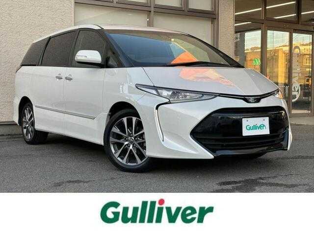 トヨタ エスティマ アエラス プレミアム G 大阪府 2017(平29)年 4.2万km ホワイトパールクリスタルシャイン 4WD/ワンオーナー/社外8型ナビ フルセグTV CD DVD BT/バックカメラ/両側パワースライドドア/パワーバックドア/衝突被害軽減ブレーキ/レーンアシスト/オートマチックハイビーム/LEDオートヘッドライト/ハーフレザーシート/前席シートヒーター/運転席パワーシート/ステアリングリモコン/スマートキー/ビルトインETC/ドラレコ/ウッドコンビステアリング/保証書 取説