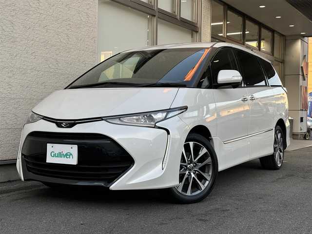 トヨタ エスティマ アエラス プレミアム G 大阪府 2017(平29)年 4.2万km ホワイトパールクリスタルシャイン 4WD/ワンオーナー/社外8型ナビ フルセグTV CD DVD BT/バックカメラ/両側パワースライドドア/パワーバックドア/衝突被害軽減ブレーキ/レーンアシスト/オートマチックハイビーム/LEDオートヘッドライト/ハーフレザーシート/前席シートヒーター/運転席パワーシート/ステアリングリモコン/スマートキー/ビルトインETC/ドラレコ/ウッドコンビステアリング/保証書 取説